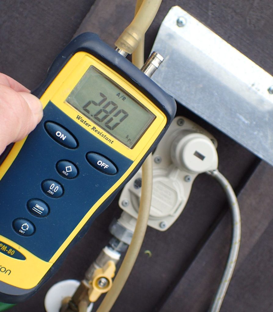 Photo showing hand held gas meter reader with numbers 280 on display